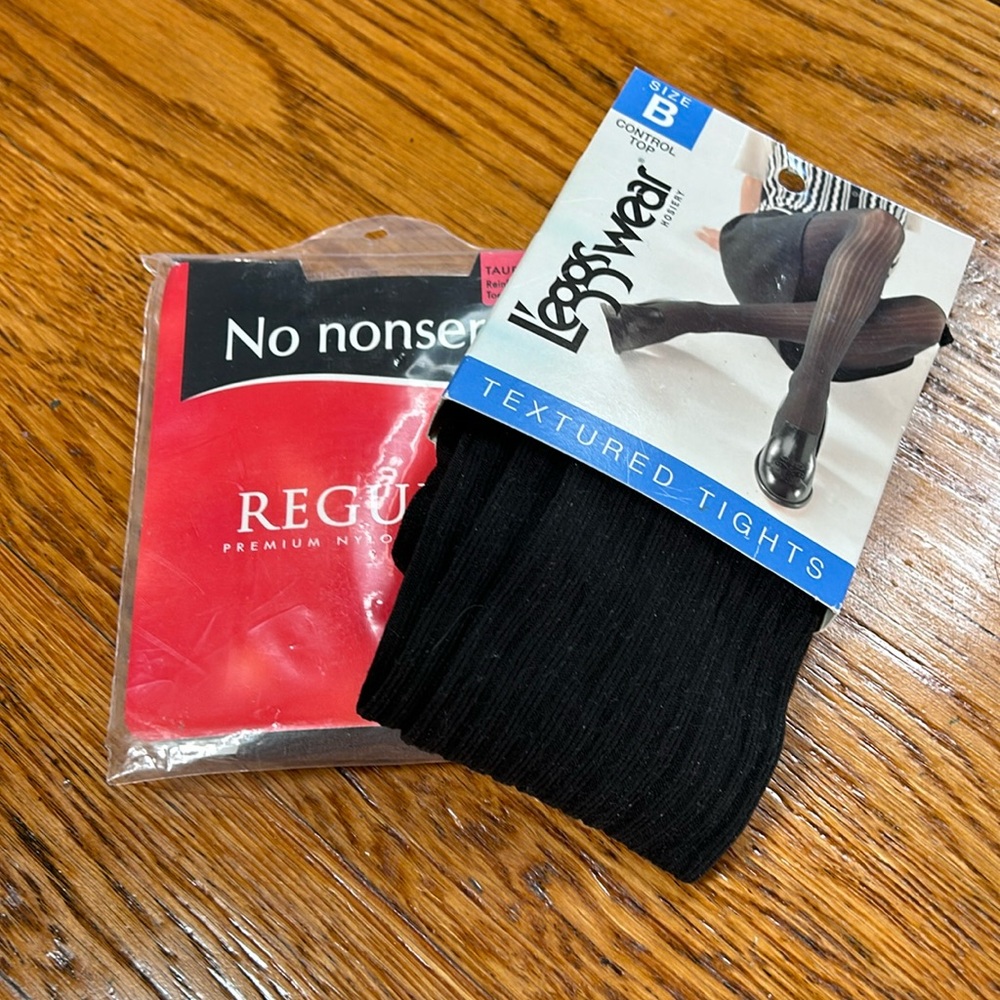 Leggs Wear black textured tights and taupe pantyhose.  New in packages.